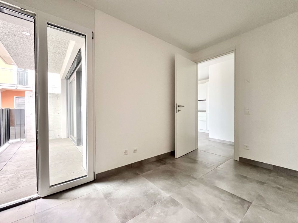 AFFITTASI 2.5 AL PIANO TERRA CON TERRAZZO A LUGANO TESSERETE - Bild 4