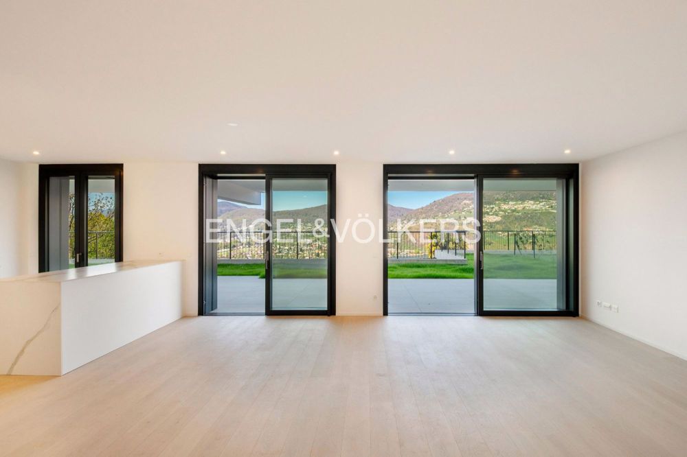 Appartamento di nuova costruzione con giardino e vista lago (Q) - Bild 2