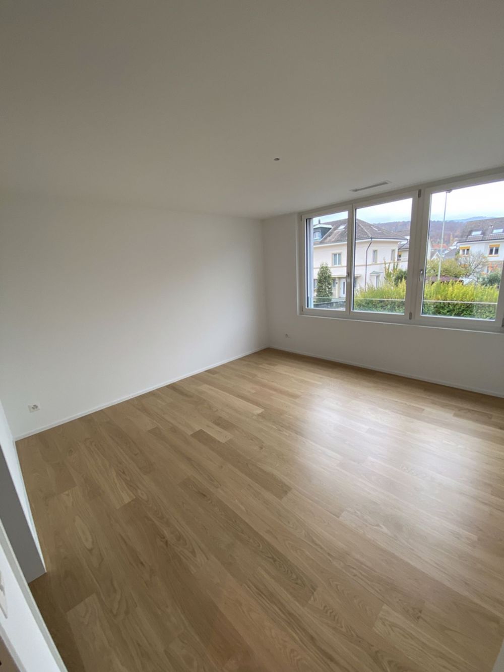 Neubau Wohnung in mitten von Aesch - 14183.01.0102_Zimmer.jpg
