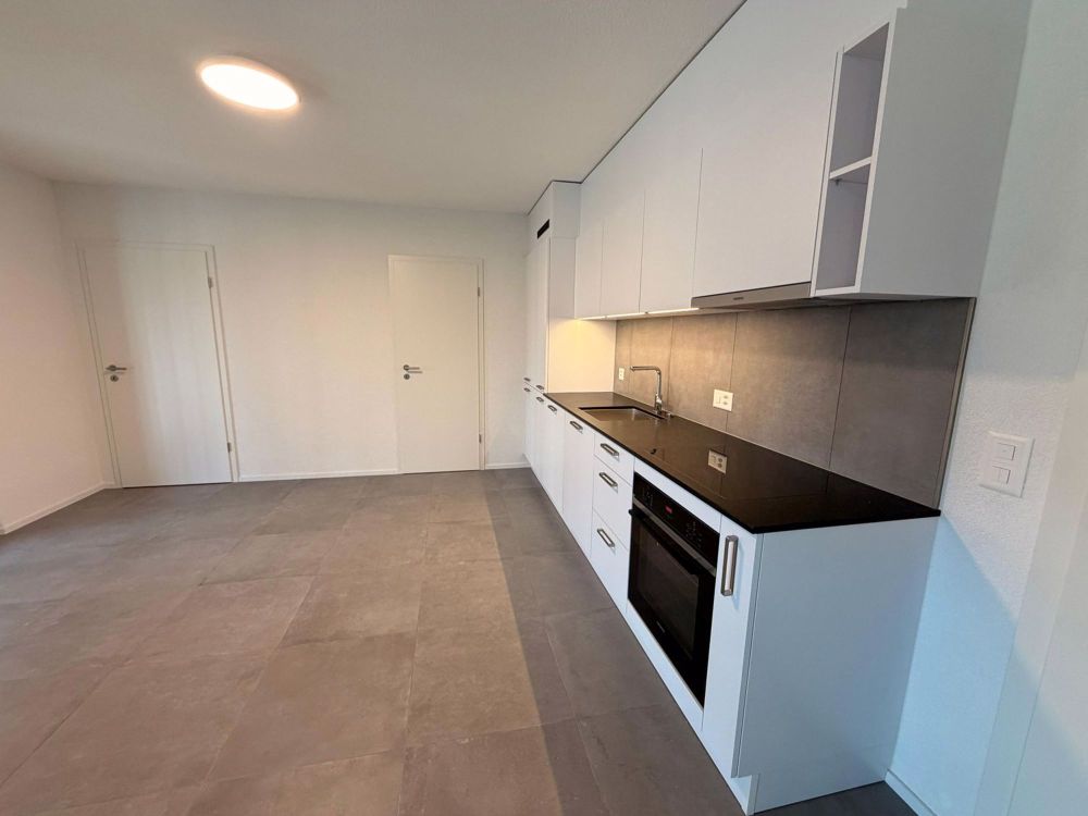 Neue 2.5-Zimmer-Wohnung in Coeuve mit privatem Bad - Bild 1