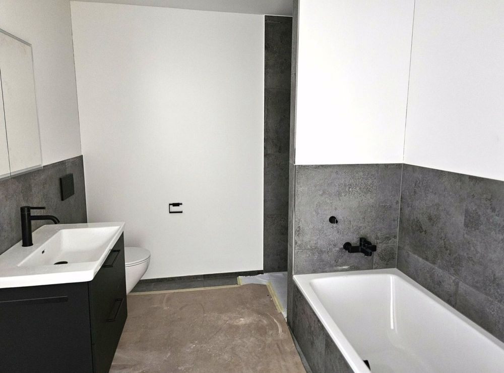 Traumhafte Neubau-Wohnung mit Seesicht - Badezimmer