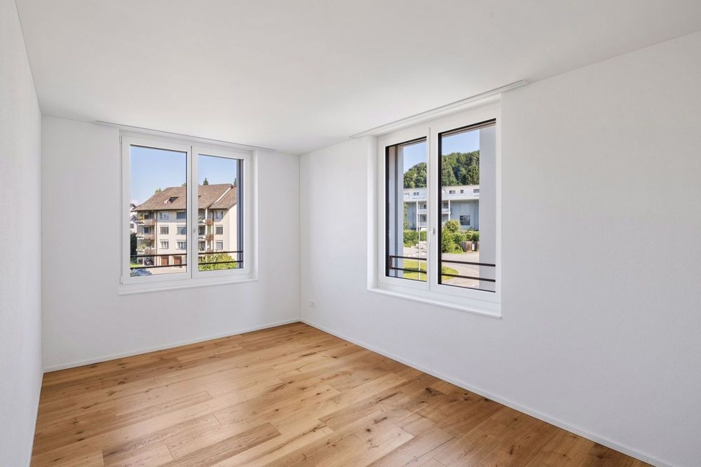 Hochmoderne 3.5-Zimmerwohnung mit Balkon im Erstbezug - Zimmer