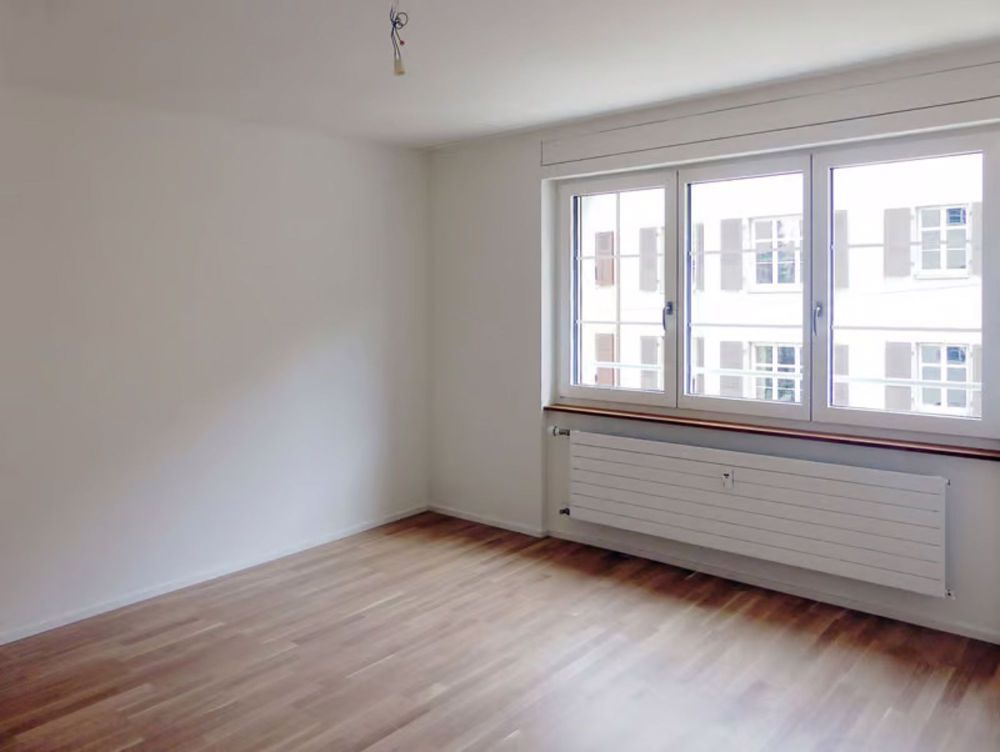 Neuwertige 3,5 Zimmer Eigentumswohnung an toller Lage direkt am Rhein - Bild 1