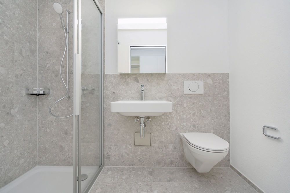 Moderne Wohnung in Bahnhofsnähe - Badezimmer mit Dusche