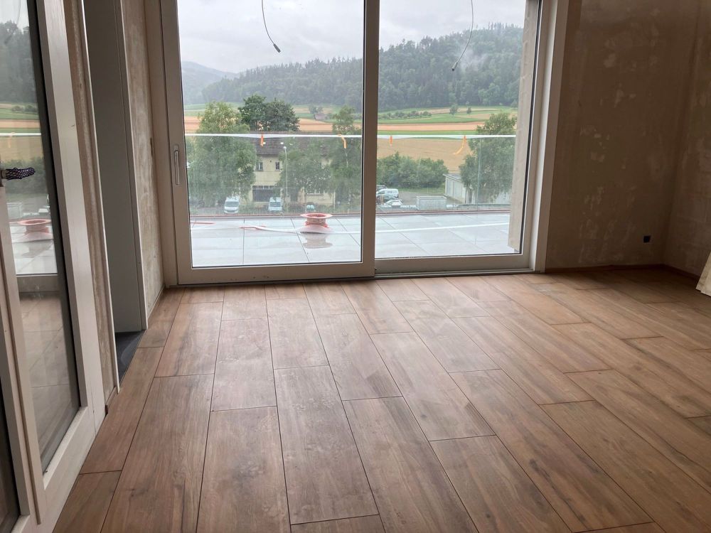 ERSTVERMIETUNG - Maisonette-Wohnung mit grosser Kochinsel! - Bild 10