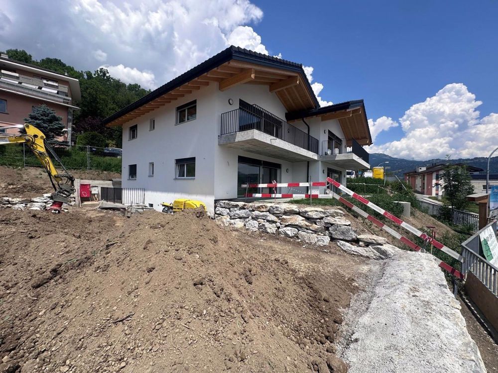 Nouvelle construction - Appartement 2.5 pièces en rez-de-chaussée avec terrasse et jardin - Bild 1