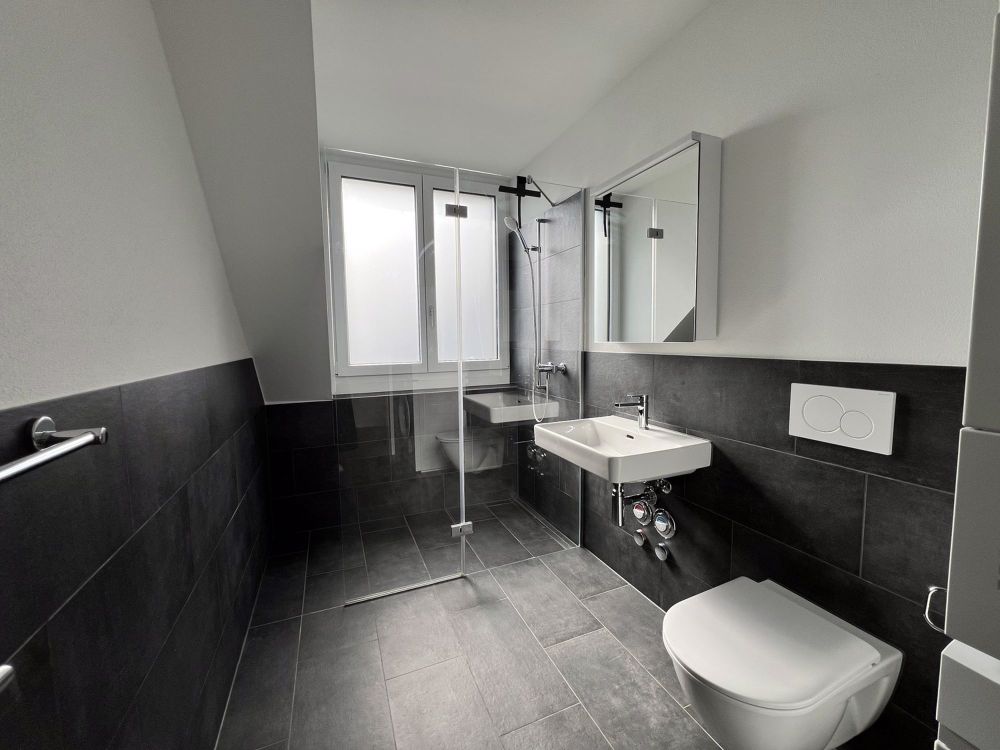 Modernes Wohnen an familienfreundlicher Lage - Bad mit Dusche