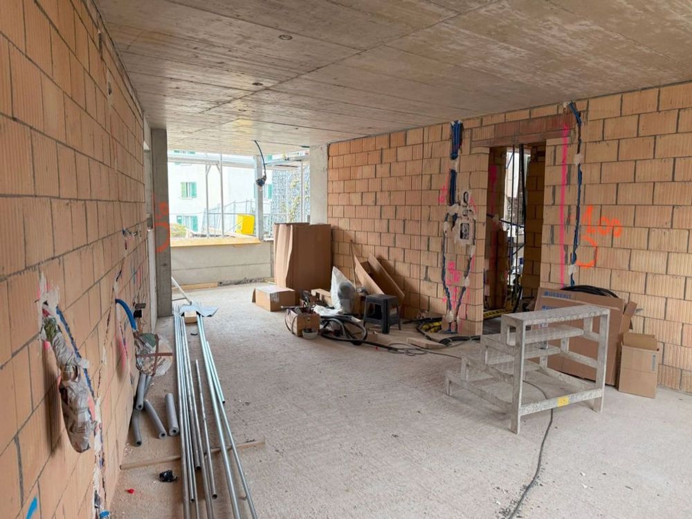 Attraktive 2 1/2 Zimmer-Neubauwohnung an zentraler Lage - Küche/Wohnen