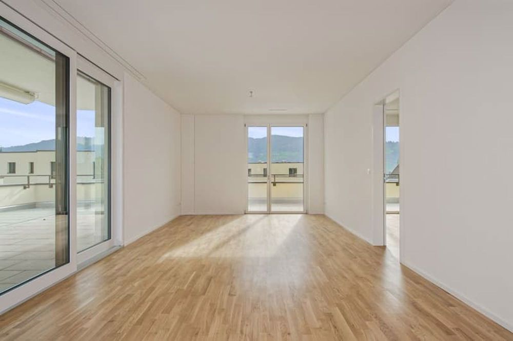Neubauwohnung an traumhafter Lage direkt am Seeufer in Rapperswil-Jona - Wohnzimmer
