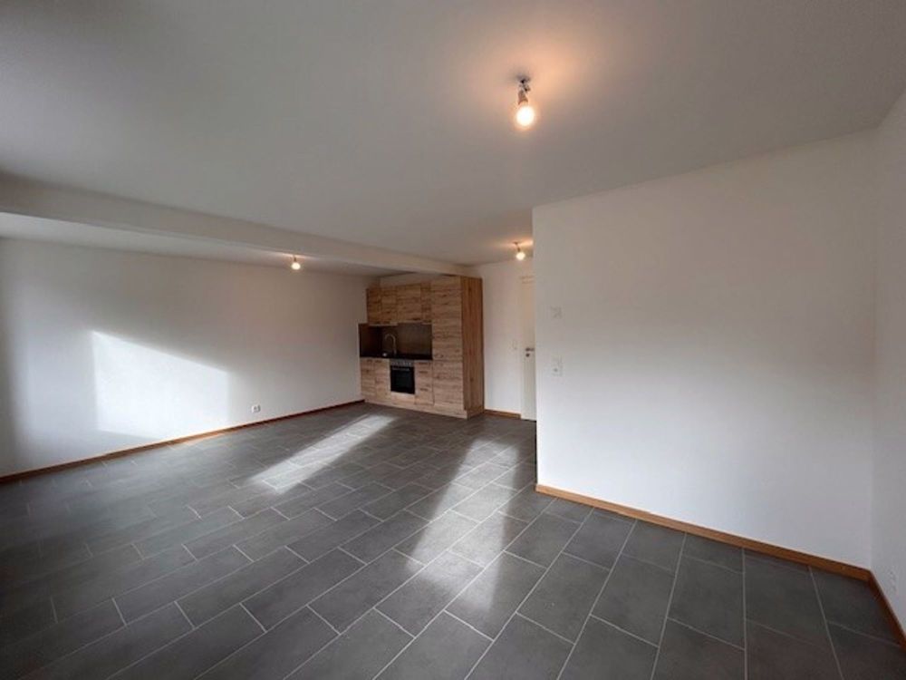 Nouvelle construction - Magnifique studios & 2.5 pièces - cuisine-sejour.jpg