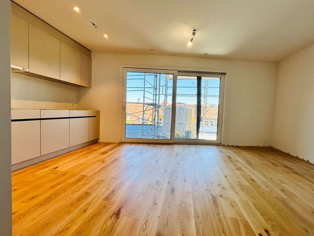 Neubau (2025): 1.5 Zimmer Maisonette - Wohnung mit grosser Terrasse und Aussicht auf Basel - Bild 1