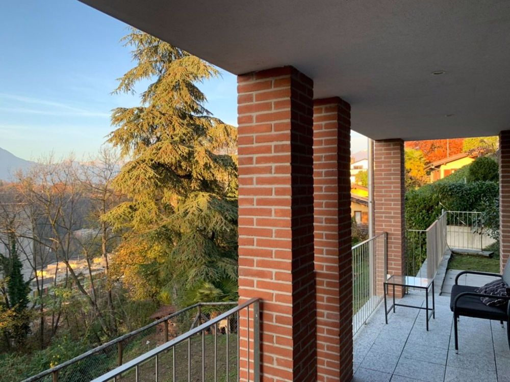 Moderno appartamento 2.5 locali con balcone a Pazzallo - Bild 4