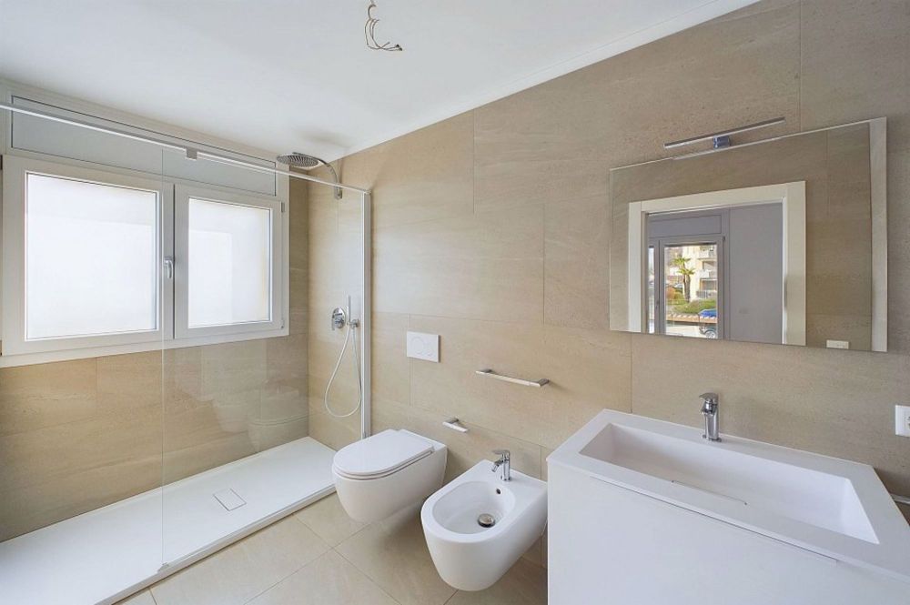 Moderno appartamento a reddito di 3½ locali in ottima posizione - Bild 12