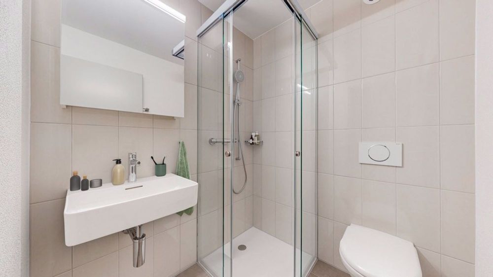 Hindernisfreies Wohnen - Erstbezug nach Gesamtsanierung - Holenacker-Familie-Dusche.jpg