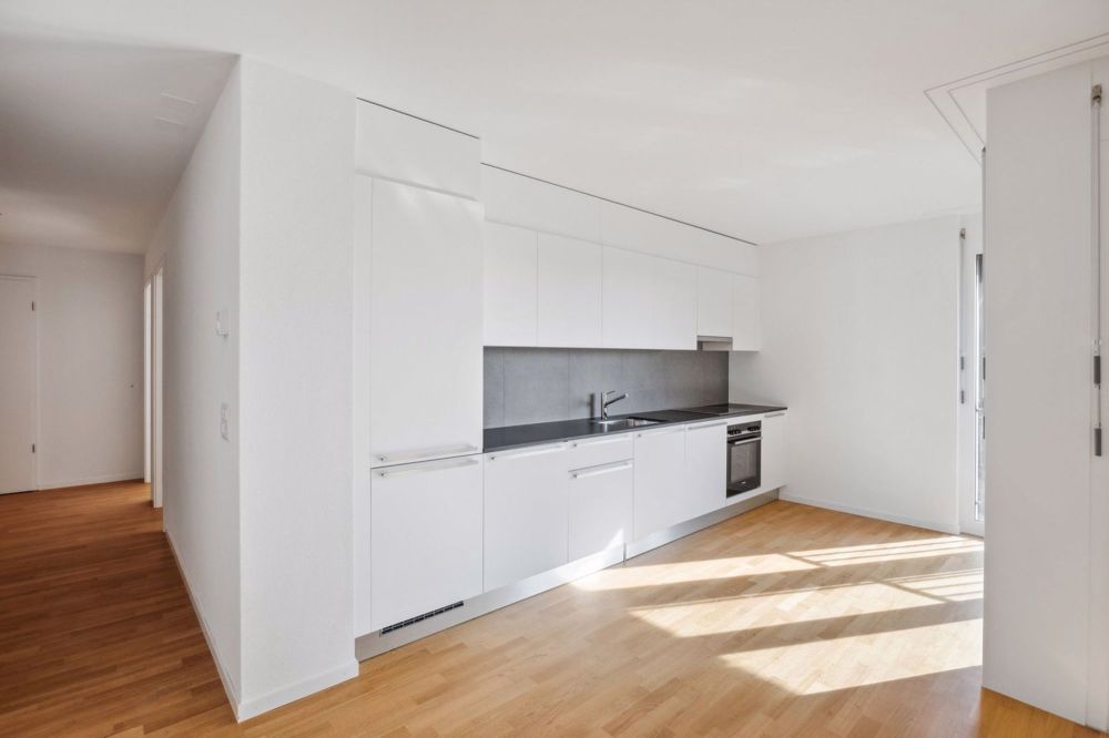 Logement dans récent quartier situé au coeur de la ville d'Orbe - Küche