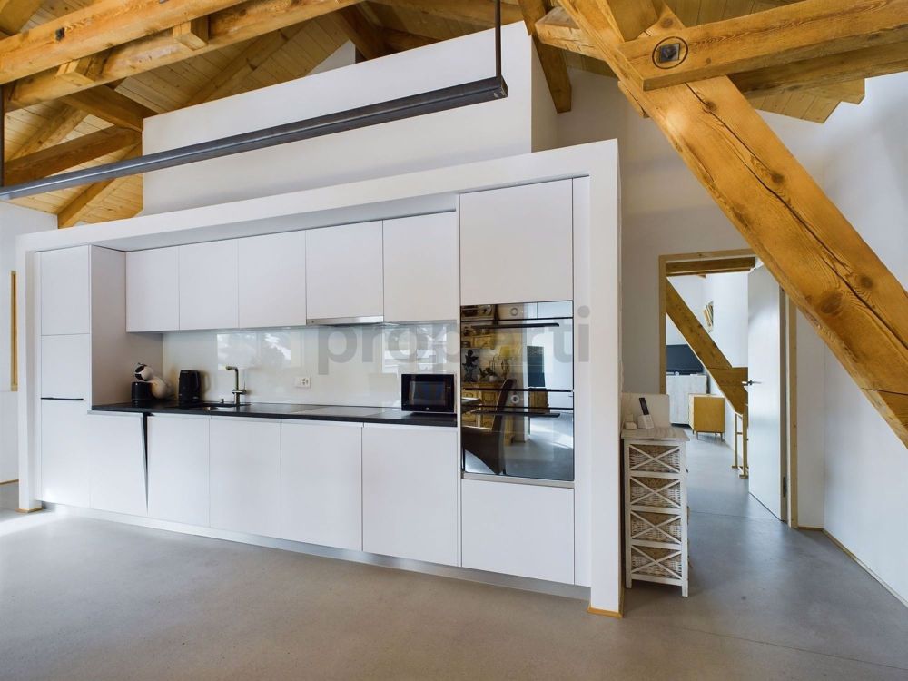 Moderne Dachwohnung mit 3.5 Zimmern in Cunter - Image 2