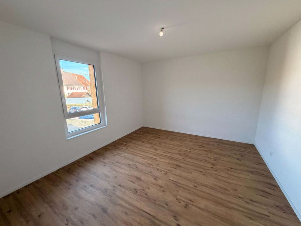 Schönes neues 3.5-Zimmer-Apartment mit großem Wohnzimmer in Coeuve - Bild 9