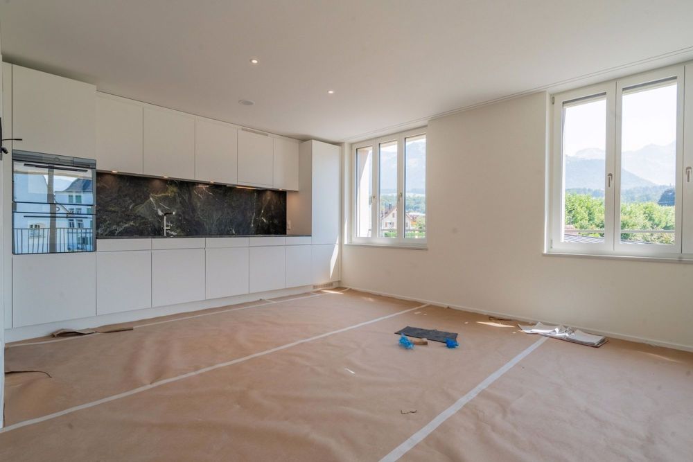 Stilvolle 2.5-Zimmer-Neubauwohnung mit Komfort und Aussicht - Küche