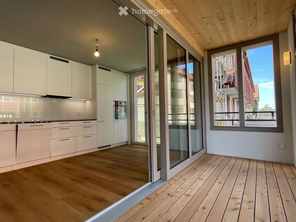 Top moderne Gartenwohnung mit Sitzplatz, Loggia und 20m2 Hobbyraum - Bild 1