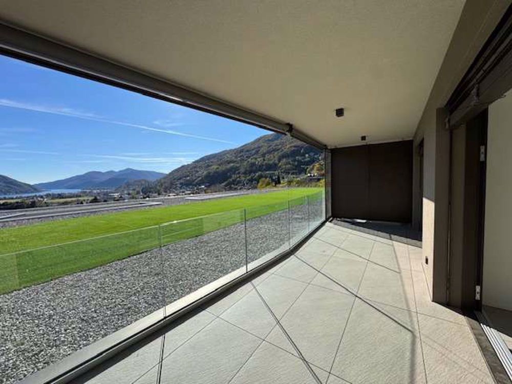 Prestigöses und neues 2.5-Zimmer-Wohnung zur Miete mit bezauberndem Seeblick in Bioggi - Bild 1