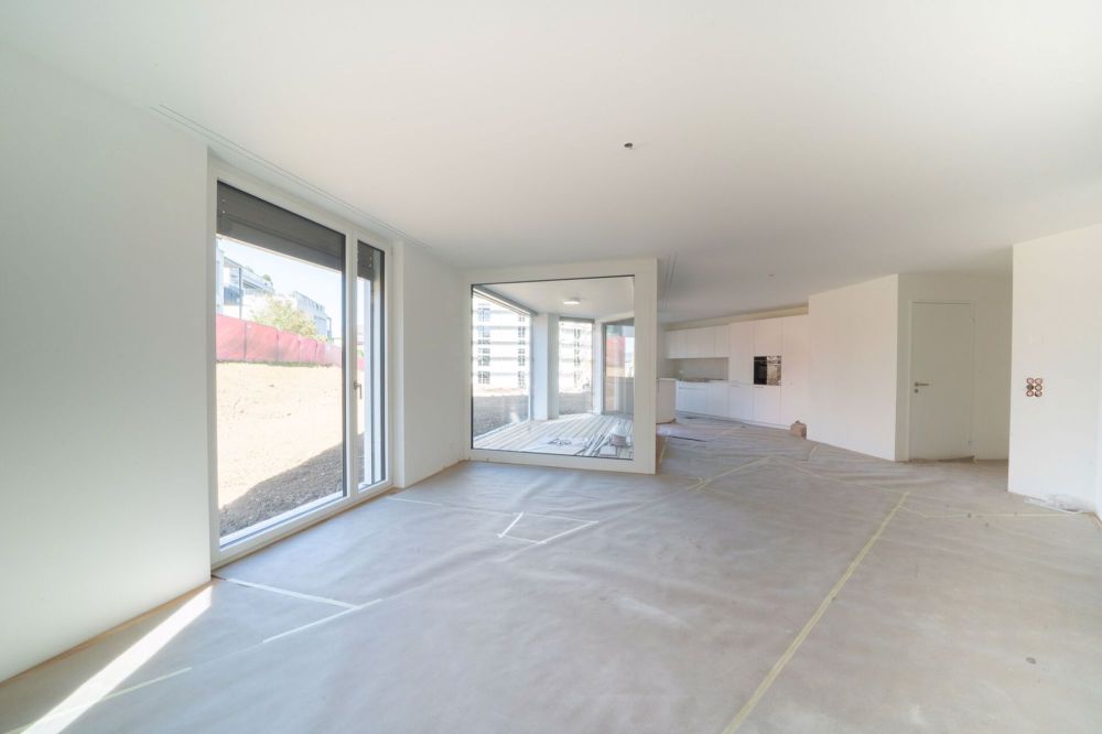 Erstbezug 3.5-Zimmer-Gartenwohnung mit ca. 138 m2 Rasenfläche - Bild 2