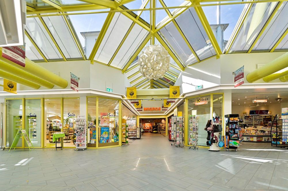 Ihr Eigenheim am Reusskanal - Häuser am Fähriweg, Buchrain - Das Einkaufszentrum Tschannhof mit Migros, Drogerie sowie Bäckerei und weiteren Dienstleistungen ist in wenigen Gehminuten erreichbar