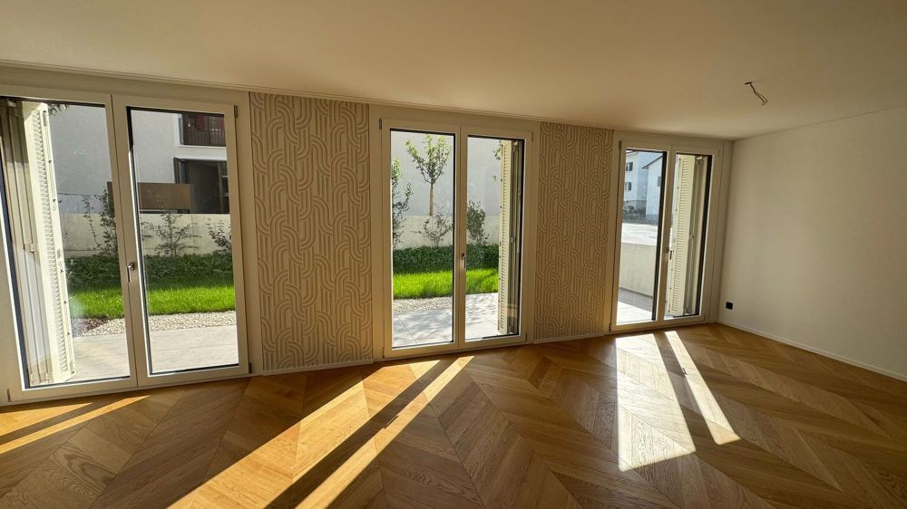 2.5-Zimmer-Wohnung mit grossem Sitzplatz in attraktivem Neubau - Bild 1