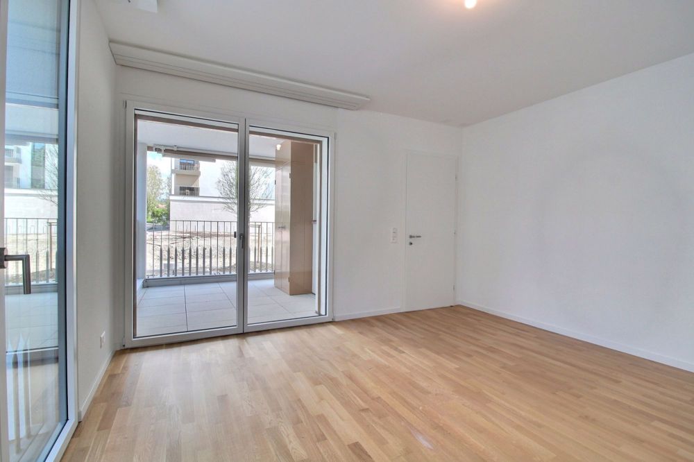 Charmant appartement de 2.5 pièces au rez-de-chaussée ! - Chambre
