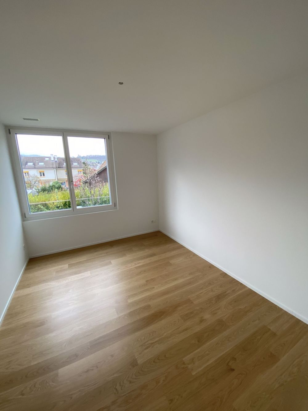 Neubau Wohnung in mitten von Aesch - 14183.01.0102_Zimmer_2.jpg