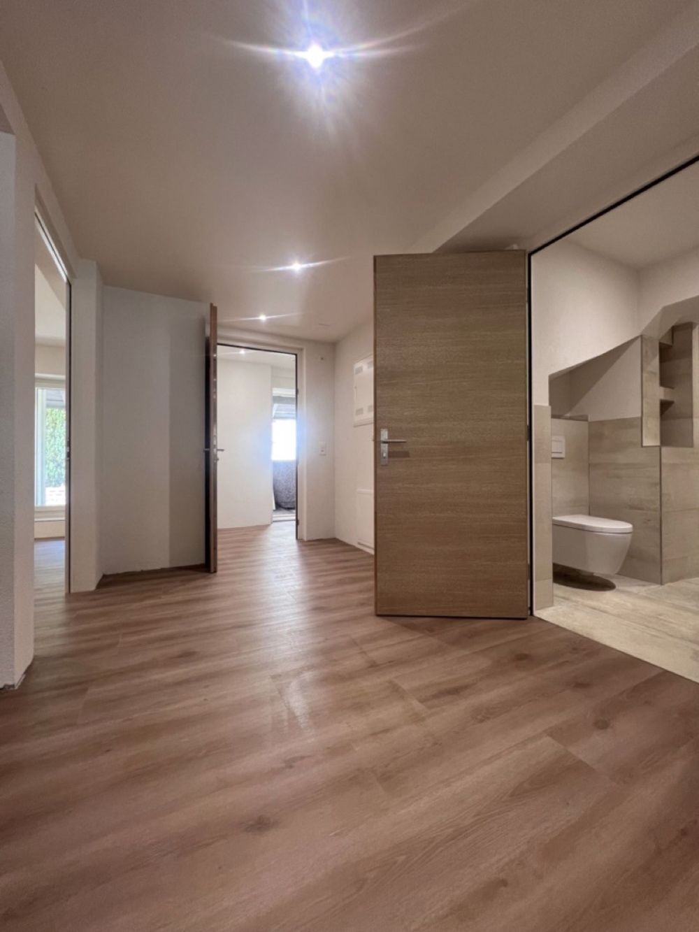 Exklusive Neubauwohnung mit stilvoller Designküche und unvergleichlichem Charme mitten in Arisdorf - Bild 5