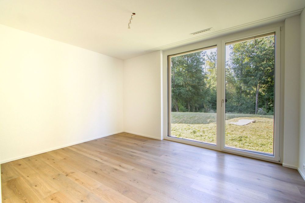 Traumhafte 4.5-Zimmer Neubauwohnung in unmittelbarer Seenähe - Zimmer 1
