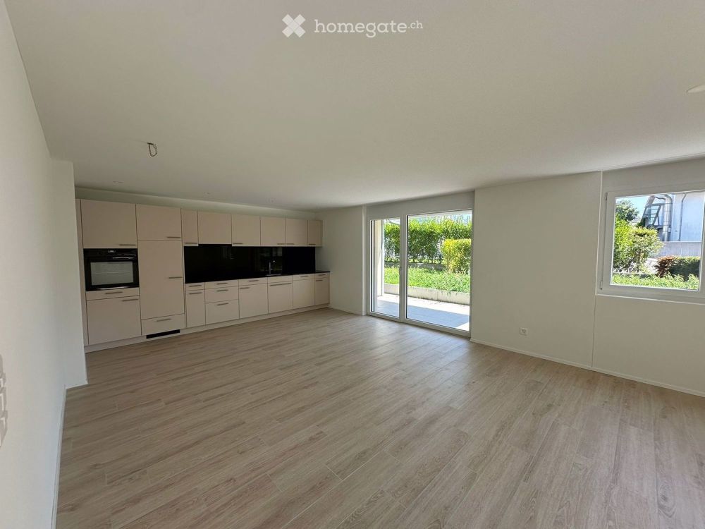 Grosszügige Erdgeschosswohnung mit Sitzplatz und Morgensonne - Bild 1