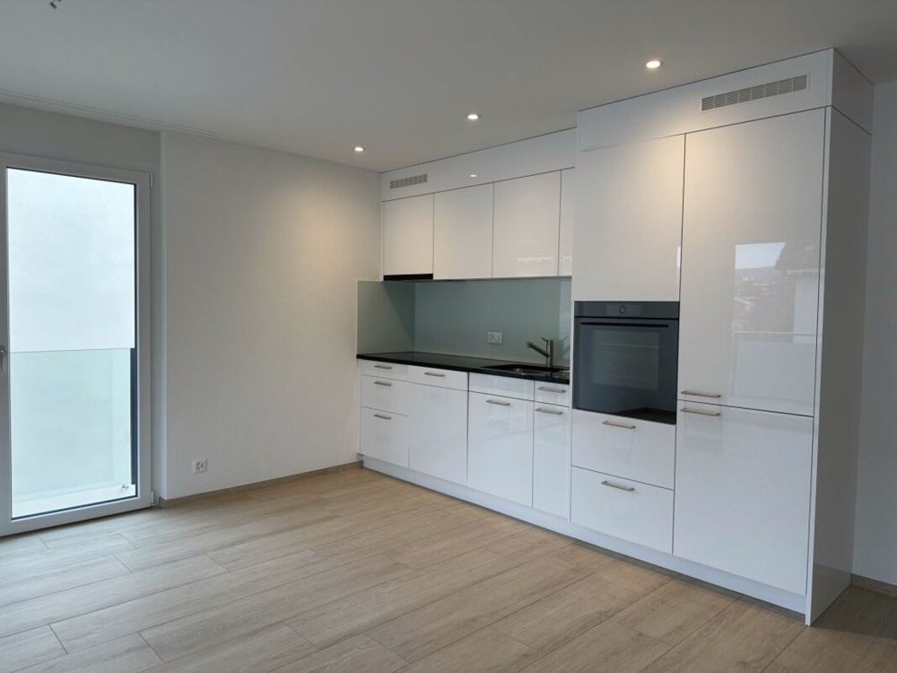 Moderne attraktive 2.5-Zimmer-Wohnung in Reinach - mit Balkon & eigenem Waschturm - Bild 1