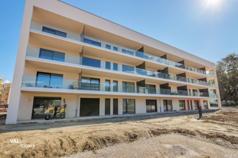 Charmant petit appartement avec place de parc souterraine - Bild 1