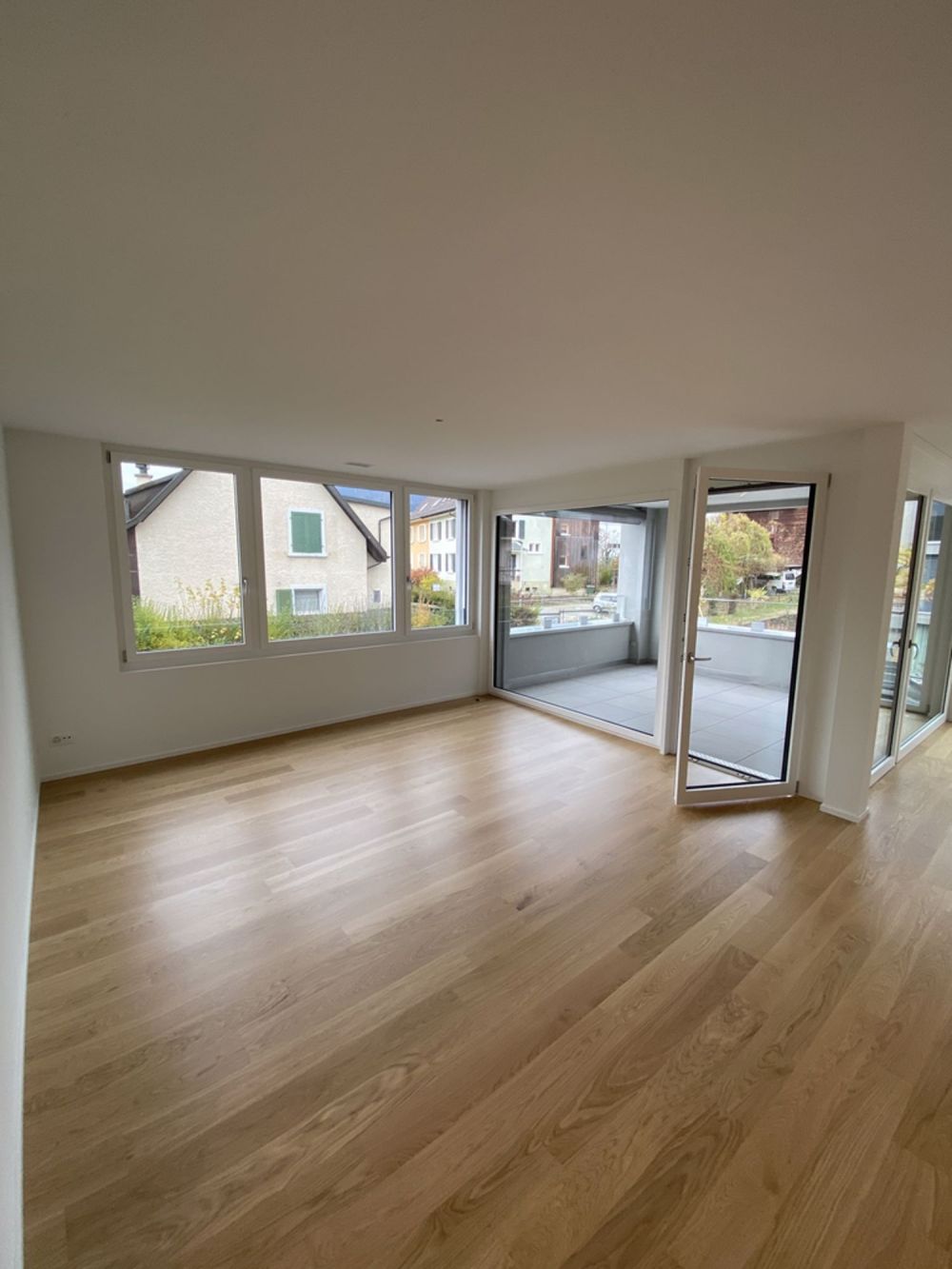 Neubau Wohnung in mitten von Aesch - 14183.01.0102_Wohnzimmer.jpg