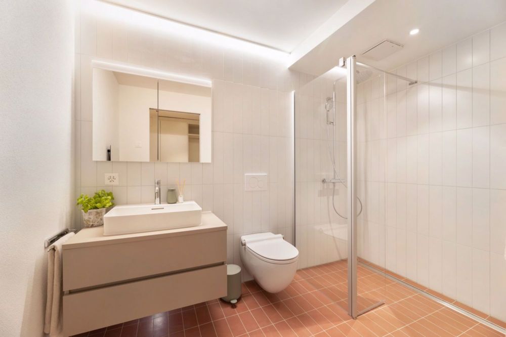 Klimatisierte 2.5 Zimmerwohnungen mit Concierge, Fitness und Pool - Badezimmer