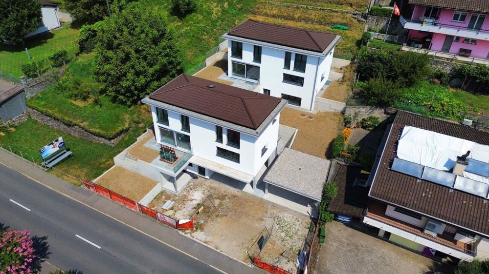 2 neue moderne 4 ½ und 5 ½ Zimmer Häuser mit allem Komfort | 2 nuove case moderne di 4½ e 5½ locali con ogni comfort - dji_fly_20240805_115428_924_1722860189367_photo_optimized (1).jpg