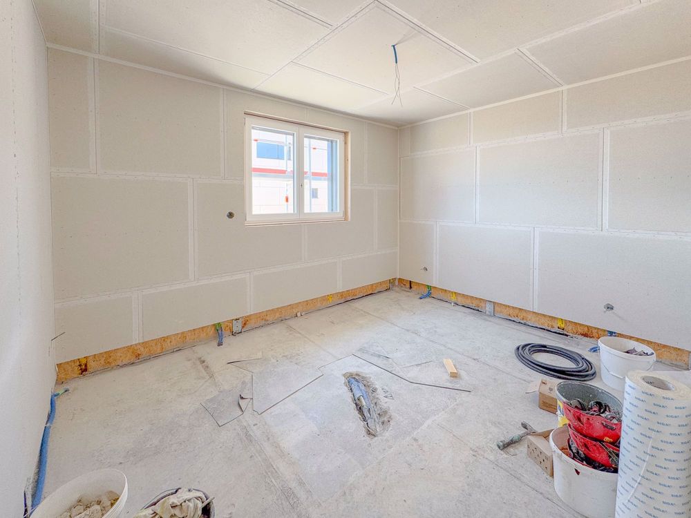Neue 5.5-Zimmer-Wohnung im Erdgeschoss mit 1 Terrasse und 2 Gärten - Chambre
