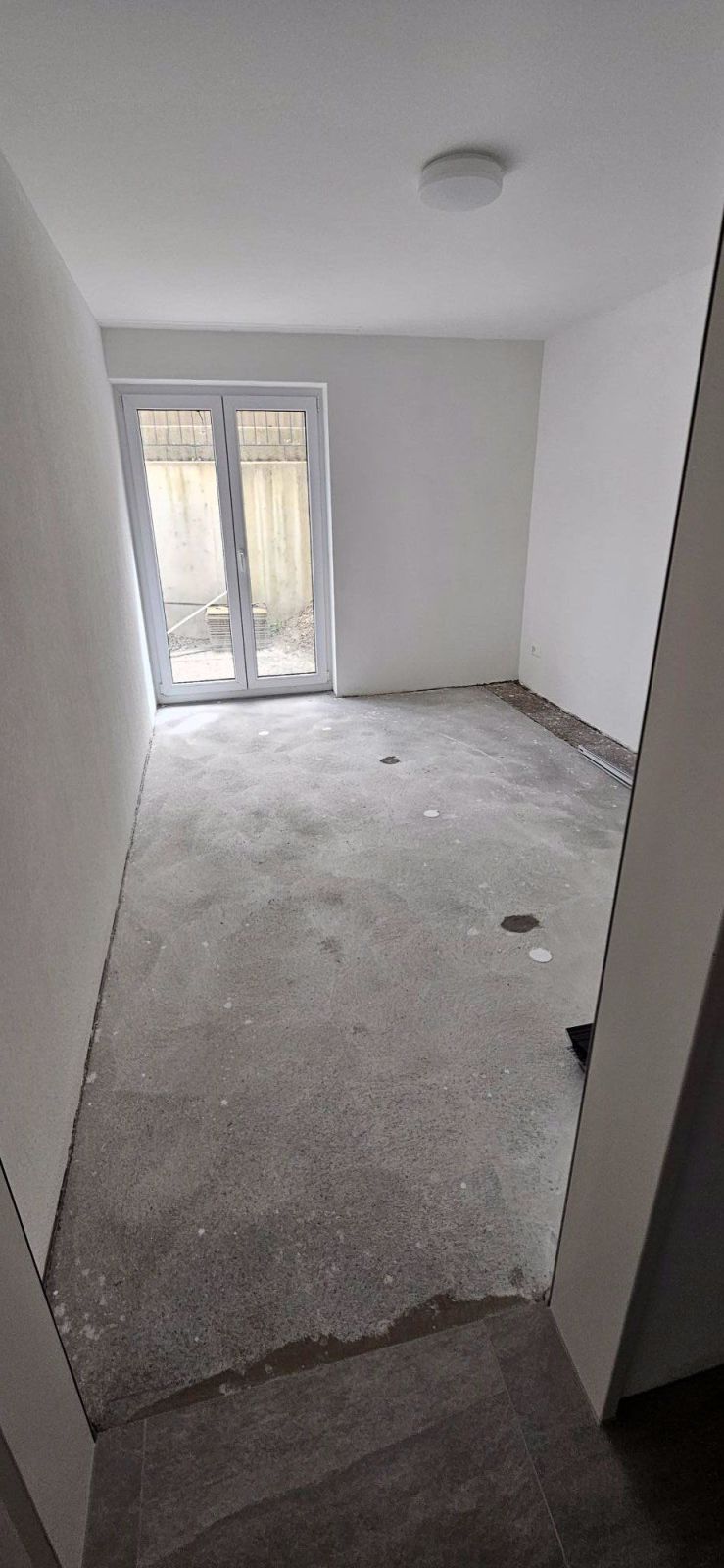 Neubau- 2.5-Zimmer-Wohnung mit Balkon im UG - Bild 3