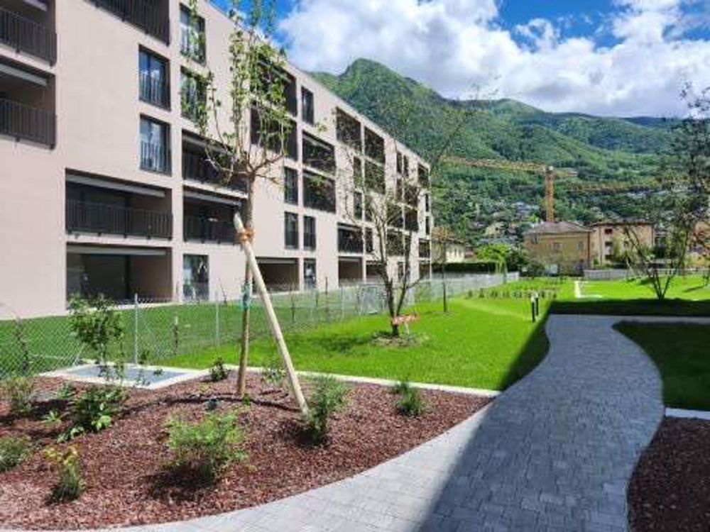 Nuovo appartamento 4.5 locali con giardino - Bild 1