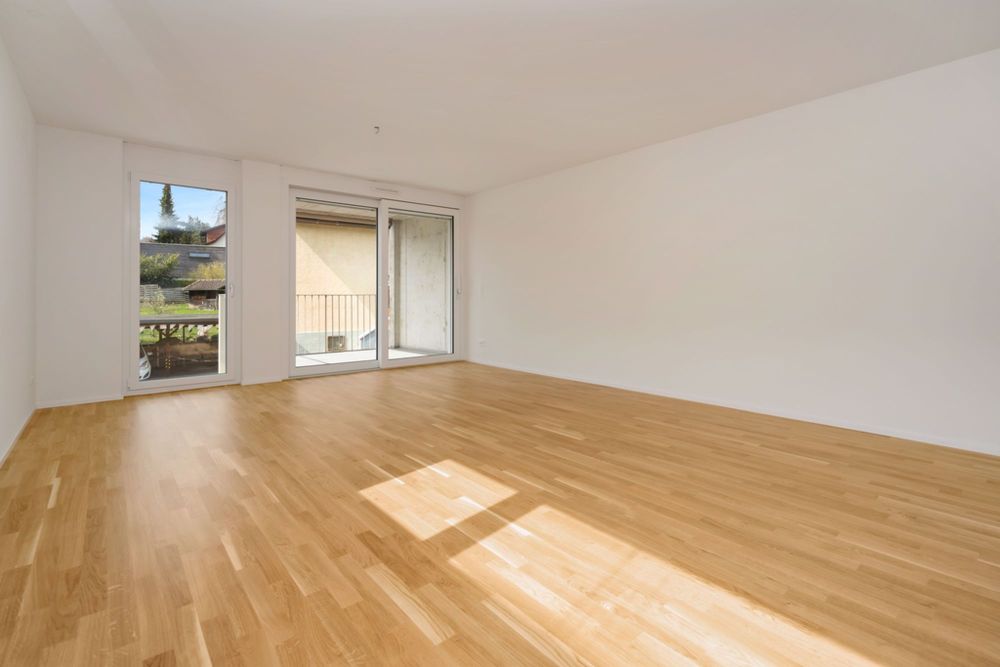 Traumhafte 3.5 Zimmer Erdgeschoss Wohnung im idyllischen Adlerweg - Wohnzimmer