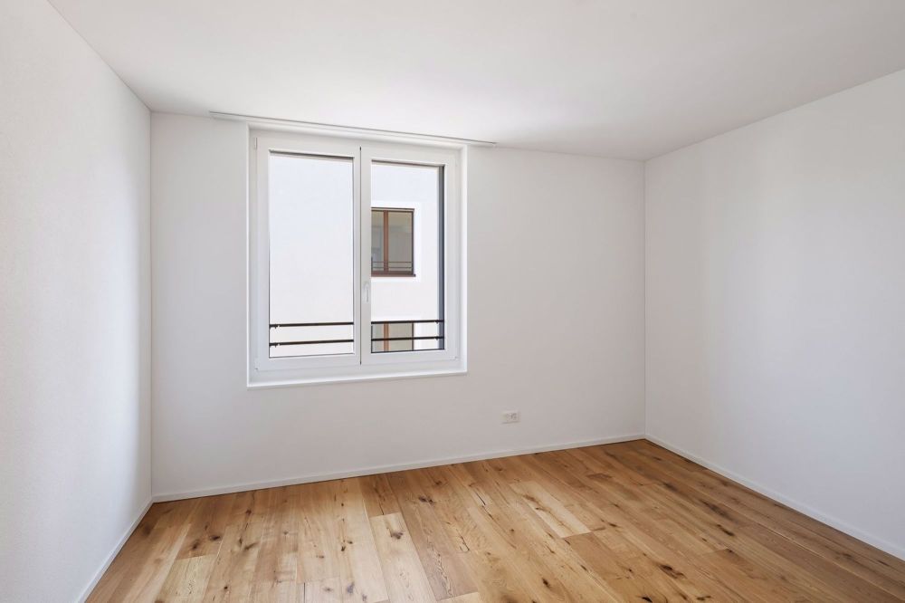 Hochmoderne 3.5-Zimmerwohnung mit Balkon im Erstbezug - Zimmer
