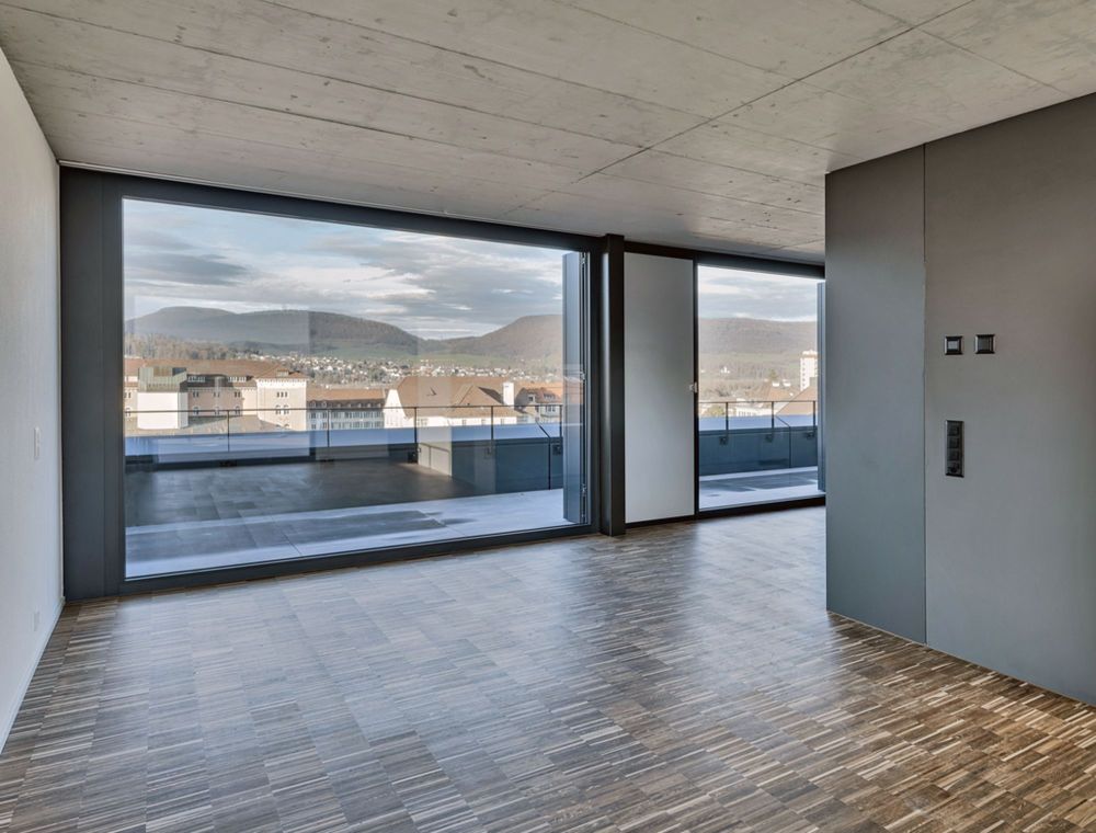 URBANES 1.5-ZIMMER-LOFT MIT AUSBLICK ÜBER AARAUS DÄCHER - Schlafbereich_hell.JPG