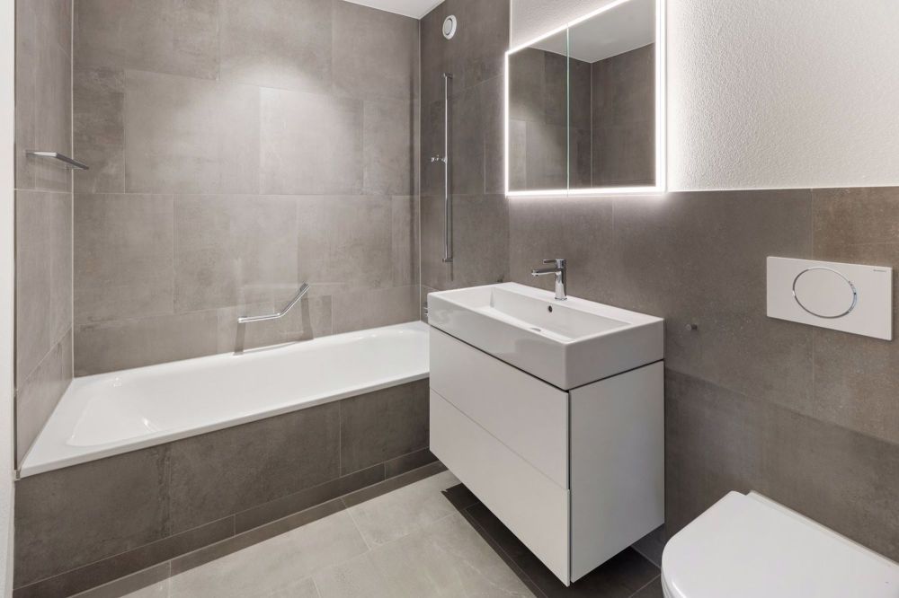 Neubau am Bächli - 4.5-Zimmerwohnungen für die ganze Familie - Badezimmer mit Badewanne