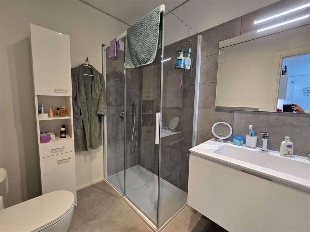 Neue 2.5-Zimmer-Wohnung mit Terrasse und Waschküche in einem Haus - Bild 10