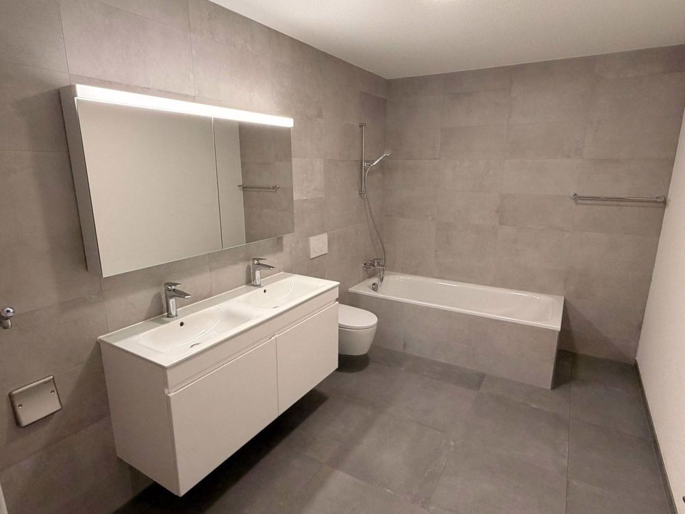 Schönes neues 3.5-Zimmer-Apartment mit großem Wohnzimmer in Coeuve - Bild 4