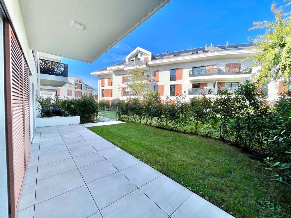 Charmanes Neubau von 2,5 Zimmern mit Terrasse und Garten - Bild 2