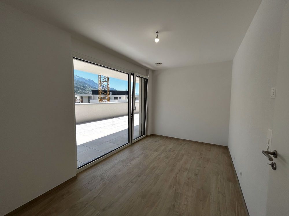 Dachgeschosswohnung mit 4.5 Zimmern in einem dynamischen Ökovieertel - Chambre 1
