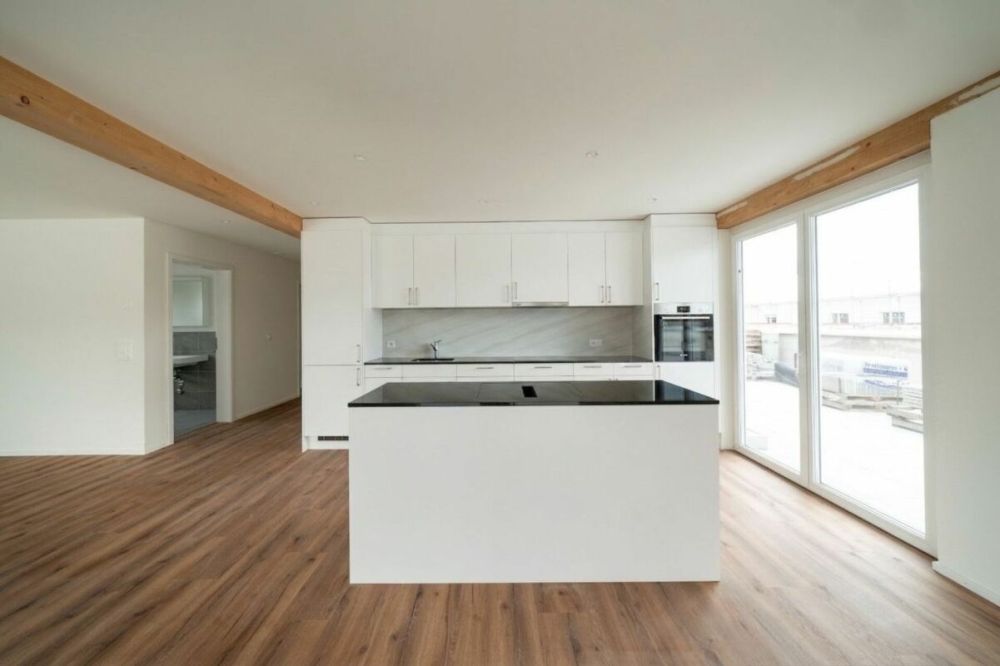 Exklusive 4.5-Zimmer-Attikawohnung mit ca. 163 m² Sonnenterrasse - Erstbezug im Neubau - Bild 6
