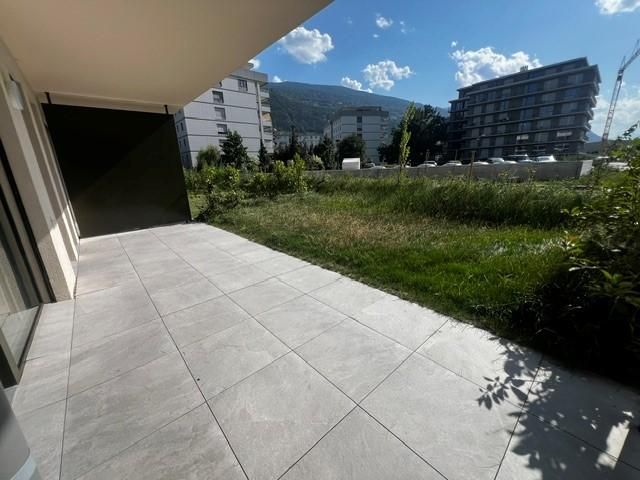 Magnifique appartement de 2,5 pièces au rez-de-chaussée, offrant une spacieuse terrasse ( G002 ) - Appartement 2.5 pièces - image - 4